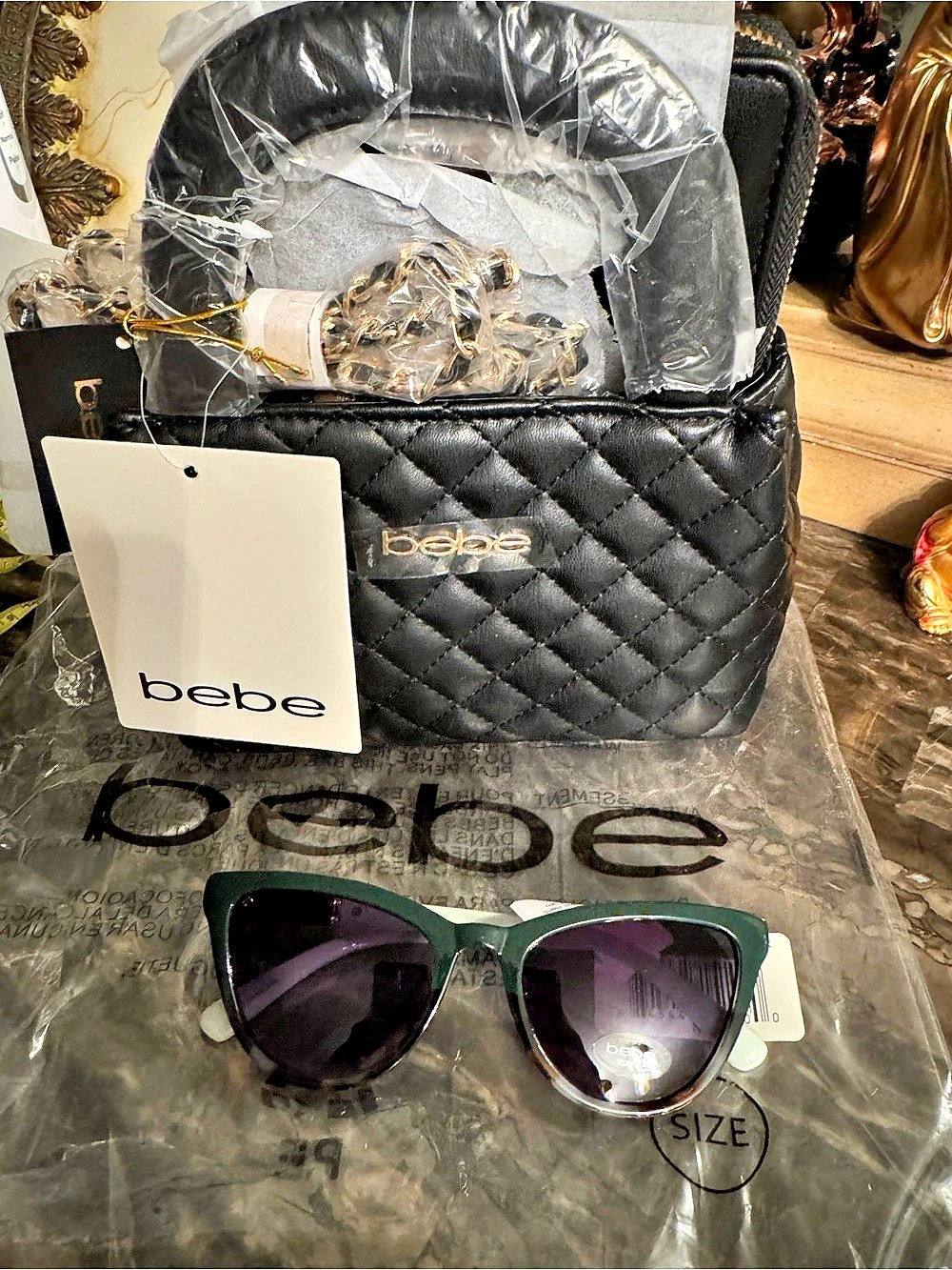 bebe Quilted Satchel With Matching Wallet in Black and sunglass trio